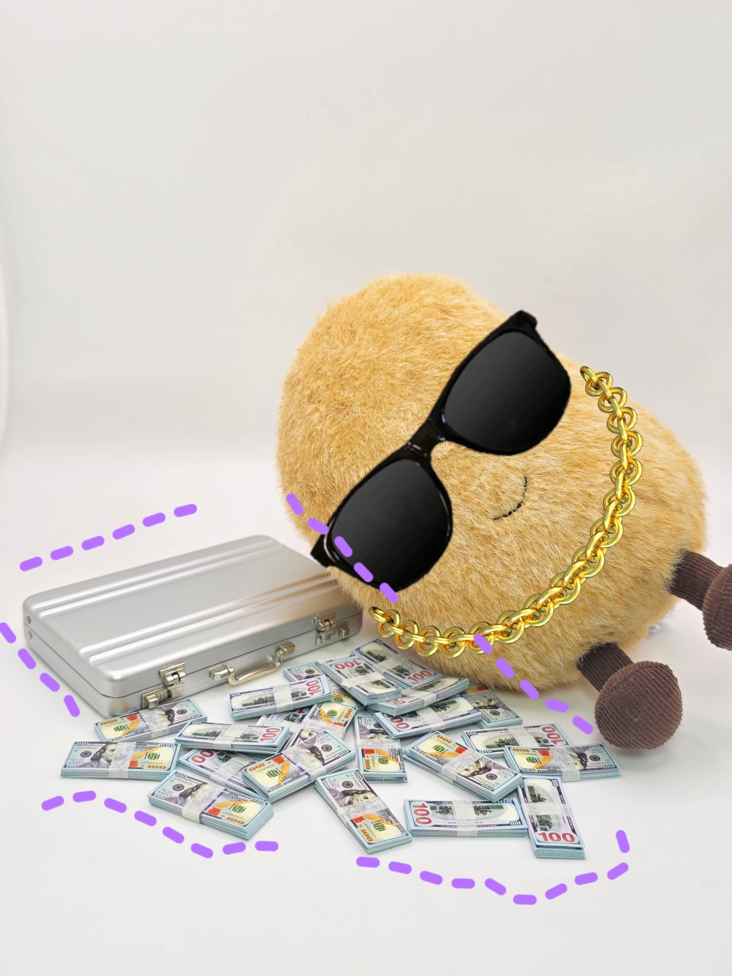 stuffed animal with sunglasses and a gold chain, next to a small suitcase with money.
