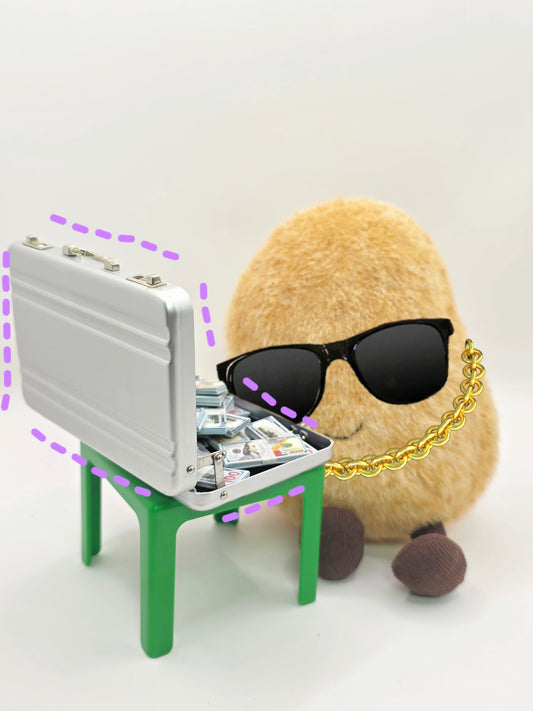 Small briefcase on a stand next to a plush toy wearing sunglasses with a chain.