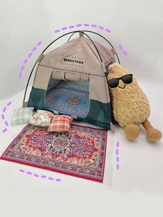 Pet tent with a plush toy and cushions on a white background